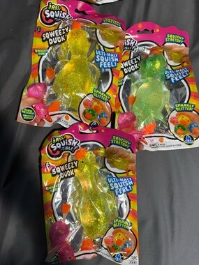 Ja-Ru Irre Squishy Tible Sqweezy Duck Sparkly